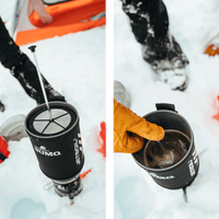 Person making tea with the Jetboil SUMO in the snow
