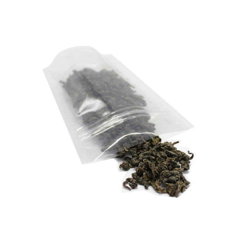 2 oz Stand Up Pouch (Transparent) - 5.0 Mil (6.50" x 3.94" x 1.02") opemed and tea spilling