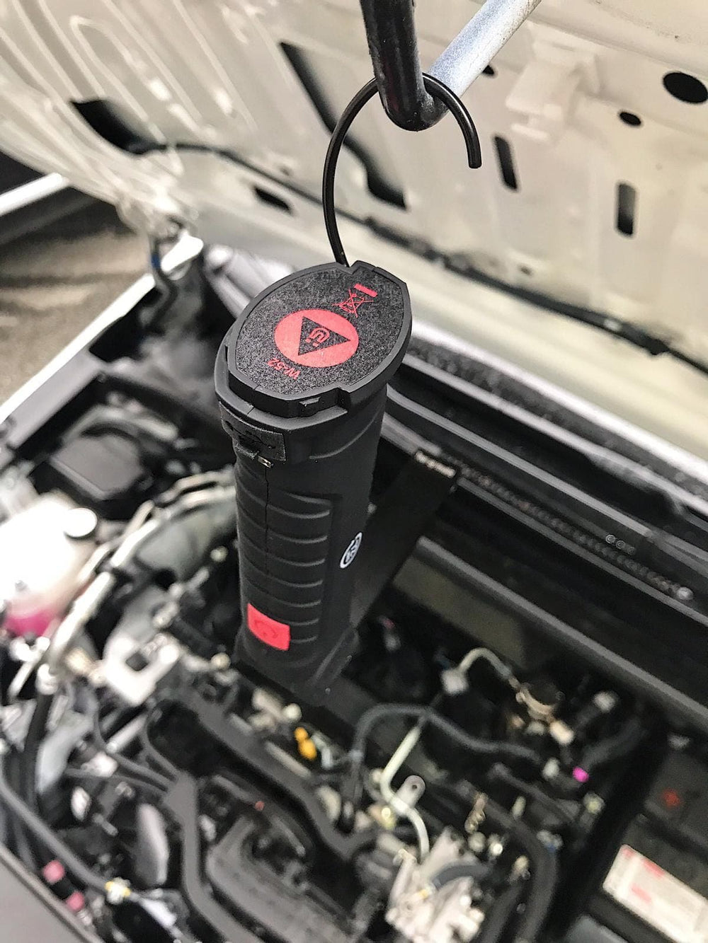 72HRS LED Work Light with hook hanging on car hood