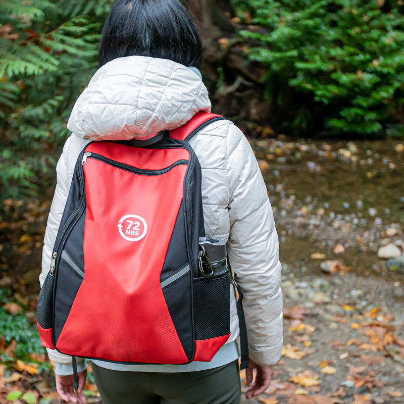 red essential backpack lifestyle outdoors