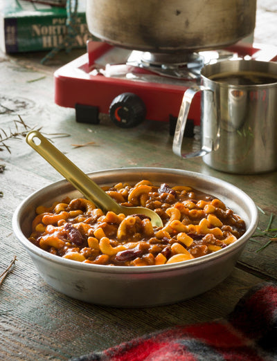 Mountain House Chili Mac with Beef #10 can served  in metal bowl on wooden table