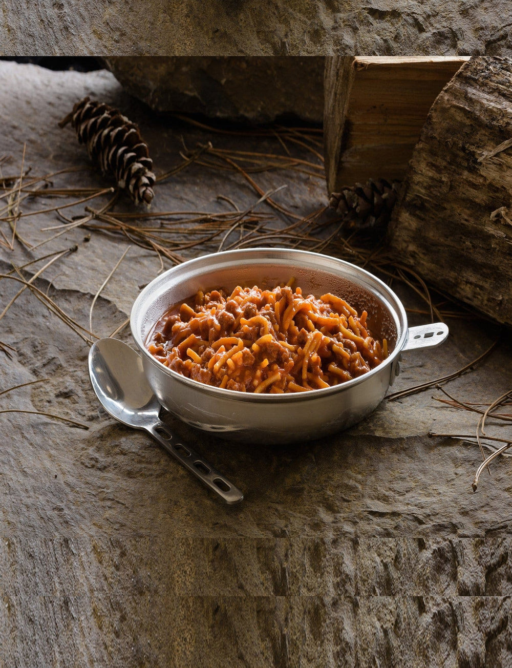 Mountain House Spaghetti with Meat Sauce #10 can served in metal pan on the ground