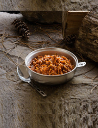 Mountain House Spaghetti with Meat Sauce #10 can served in metal pan on the ground