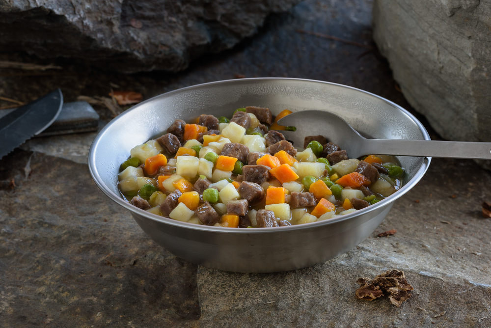 beef stew served in metal bowl