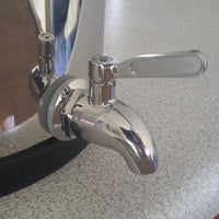 Berkey Stainless Steel™ Spigot attached to berkey system zoomed in