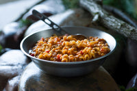 lasagna with meat sauce served in metal bowl